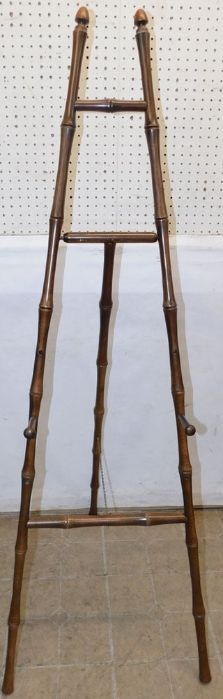 Cherry Bamboo Turned Easel: Cherry Bamboo Turned Easel. 67 1/2" H ALL DESCRIPTIONS AND ANY CONDITION STATEMENT GIVEN BY LANGSTON AUCTION GALLERY ARE STRICTLY OPINIONS AND LANGSTON'S SHALL HAVE NO RESPONSIBILITY FOR ERRORS OR OMI