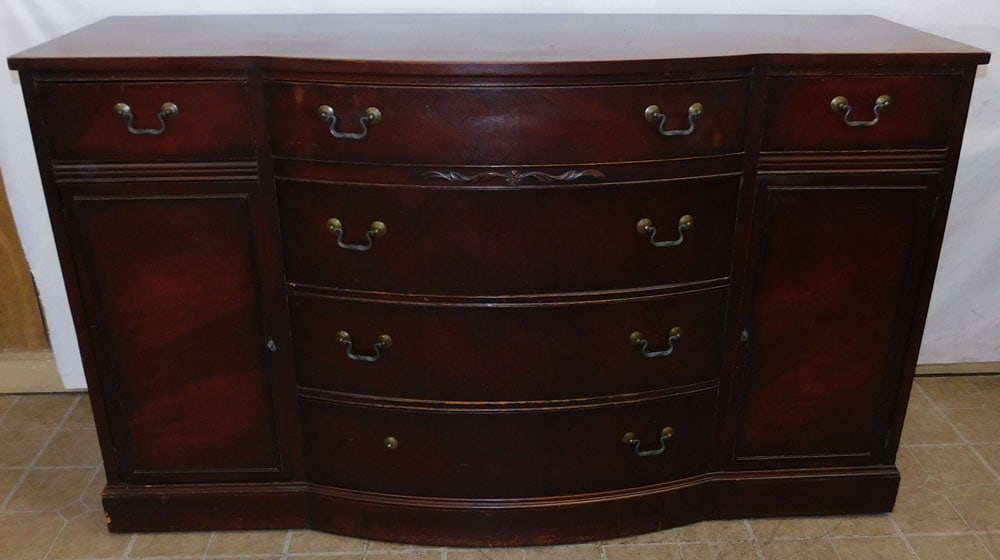 Mahogany Bow Front Sideboard: Mahogany Bow Front Sideboard. 62" W 21" D 36 1/2" H ALL DESCRIPTIONS AND ANY CONDITION STATEMENT GIVEN BY LANGSTON AUCTION GALLERY ARE STRICTLY OPINIONS AND LANGSTON'S SHALL HAVE NO RESPONSIBILITY FOR