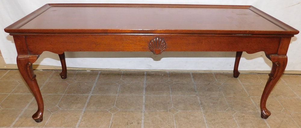 Mahogany Coffee Table: Mahogany Coffee Table. 46" W 20" D 18 1/2" H ALL DESCRIPTIONS AND ANY CONDITION STATEMENT GIVEN BY LANGSTON AUCTION GALLERY ARE STRICTLY OPINIONS AND LANGSTON'S SHALL HAVE NO RESPONSIBILITY FOR ERRORS