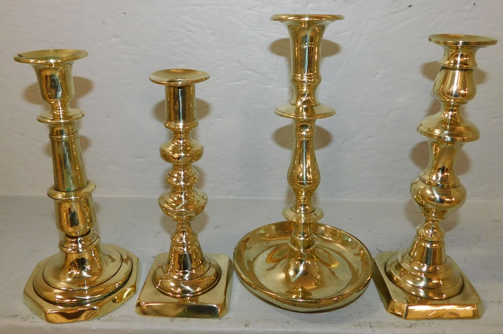 (4) 19th Century Polished Brass Candlesticks: (4) 19th Century Polished Brass Candlesticks. Up to 9 3/4" H "ALL DESCRIPTIONS AND ANY CONDITION STATEMENT GIVEN BY LANGSTON AUCTION GALLERY ARE STRICTLY OPINIONS AND LANGSTON'S SHALL HAVE NO RESPONSI