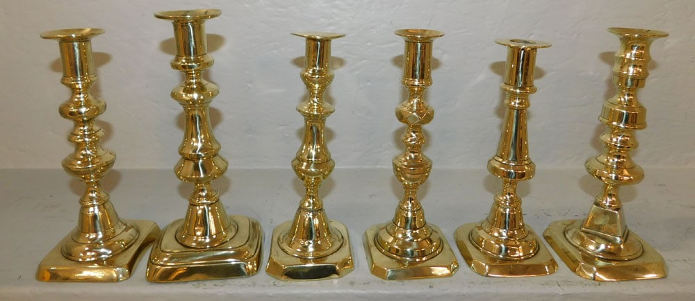 Lot of 19th Century Polished Brass Candlesticks: Lot of 19th Century Polished Brass Candlesticks. Up to 8 1/2" H "ALL DESCRIPTIONS AND ANY CONDITION STATEMENT GIVEN BY LANGSTON AUCTION GALLERY ARE STRICTLY OPINIONS AND LANGSTON'S SHALL HAVE NO RESPO