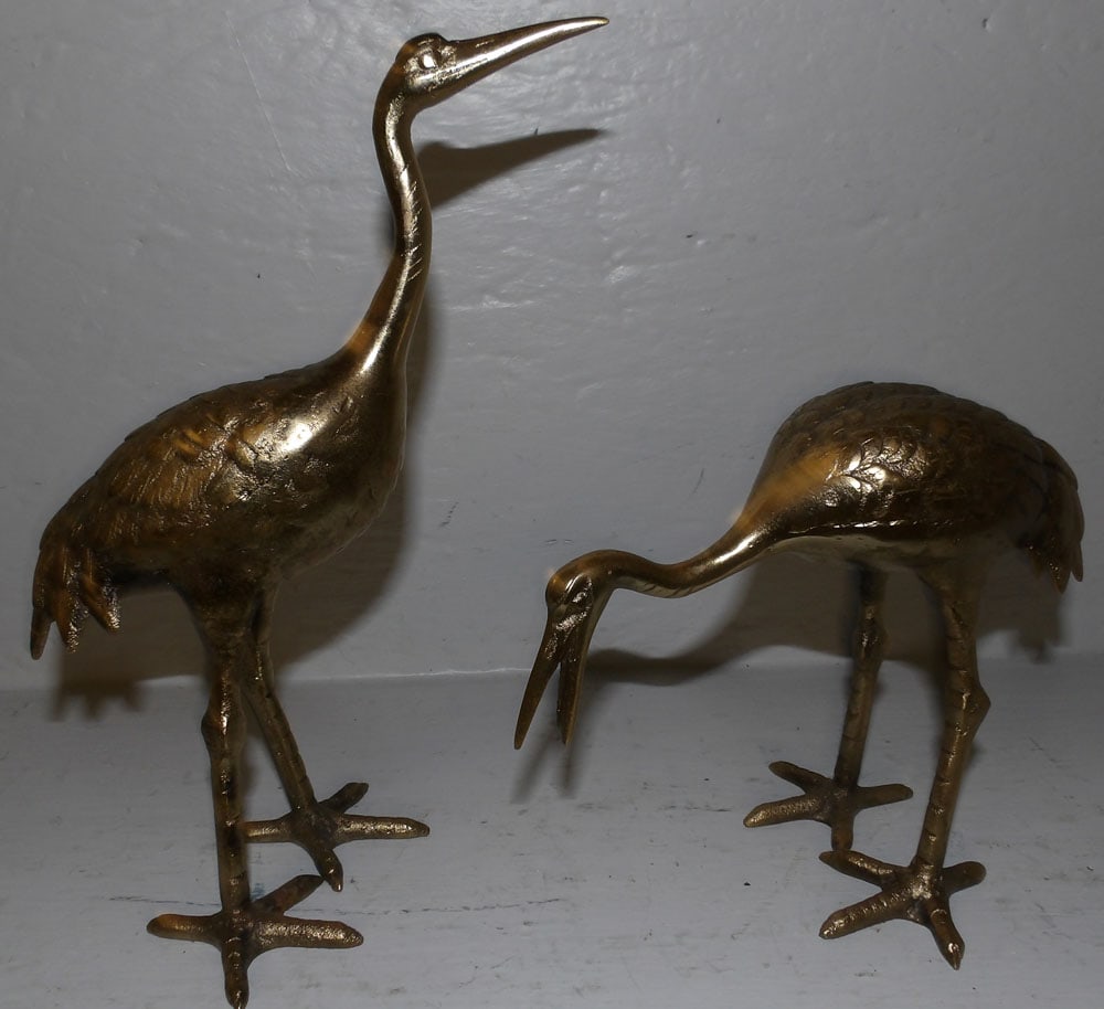 2 brass herons: 2 brass herons. Up to 9 1/4" H "ALL DESCRIPTIONS AND ANY CONDITION STATEMENT GIVEN BY LANGSTON AUCTION GALLERY ARE STRICTLY OPINIONS AND LANGSTON'S SHALL HAVE NO RESPONSIBILITY FOR ERRORS OR OMISSIONS