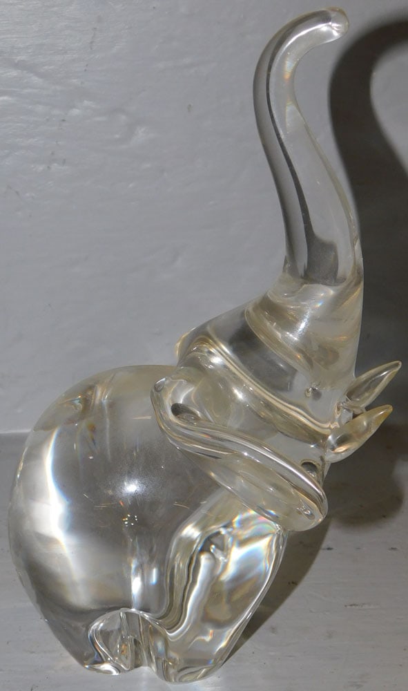 signed Steuben elephant paperweight: signed Steuben elephant paperweight. 8 1/4" H "ALL DESCRIPTIONS AND ANY CONDITION STATEMENT GIVEN BY LANGSTON AUCTION GALLERY ARE STRICTLY OPINIONS AND LANGSTON'S SHALL HAVE NO RESPONSIBILITY FOR ERRO
