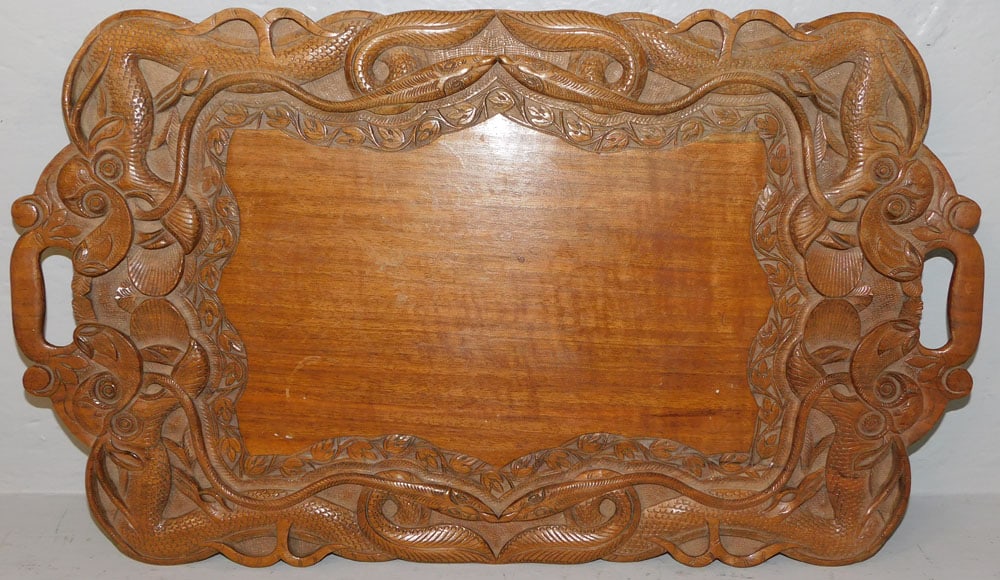oriental carved teak wood tray: oriental carved teak wood tray. 23 1/4" x 13 3/4" "ALL DESCRIPTIONS AND ANY CONDITION STATEMENT GIVEN BY LANGSTON AUCTION GALLERY ARE STRICTLY OPINIONS AND LANGSTON'S SHALL HAVE NO RESPONSIBILITY FOR 