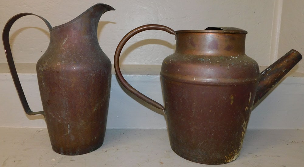 2 Copper pitchers: 2 Copper pitchers. Up to 12 1/4" H "ALL DESCRIPTIONS AND ANY CONDITION STATEMENT GIVEN BY LANGSTON AUCTION GALLERY ARE STRICTLY OPINIONS AND LANGSTON'S SHALL HAVE NO RESPONSIBILITY FOR ERRORS OR OMISS