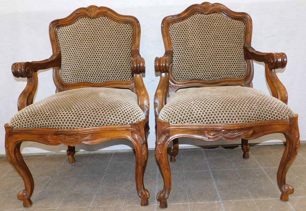 Pair of Carved Walnut French Arm Chairs: Pair of Carved Walnut French Arm Chairs . 36" H "ALL DESCRIPTIONS AND ANY CONDITION STATEMENT GIVEN BY LANGSTON AUCTION GALLERY ARE STRICTLY OPINIONS AND LANGSTON'S SHALL HAVE NO RESPONSIBILITY FOR ER