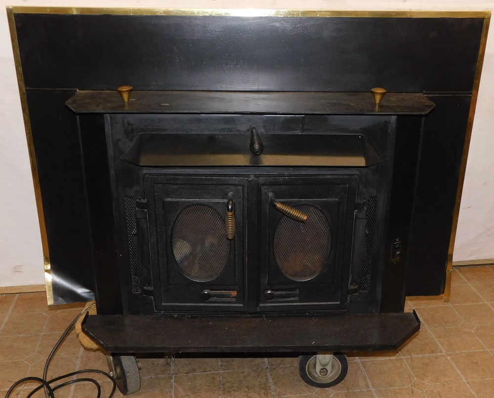 Cast Iron & Brass Fireplace by Silent Flame, (Working): Cast Iron & Brass Fireplace by Silent Flame, (Working). 48 1/4" W 30" D 33" H "ALL DESCRIPTIONS AND ANY CONDITION STATEMENT GIVEN BY LANGSTON AUCTION GALLERY ARE STRICTLY OPINIONS AND LANGSTON'S SHALL