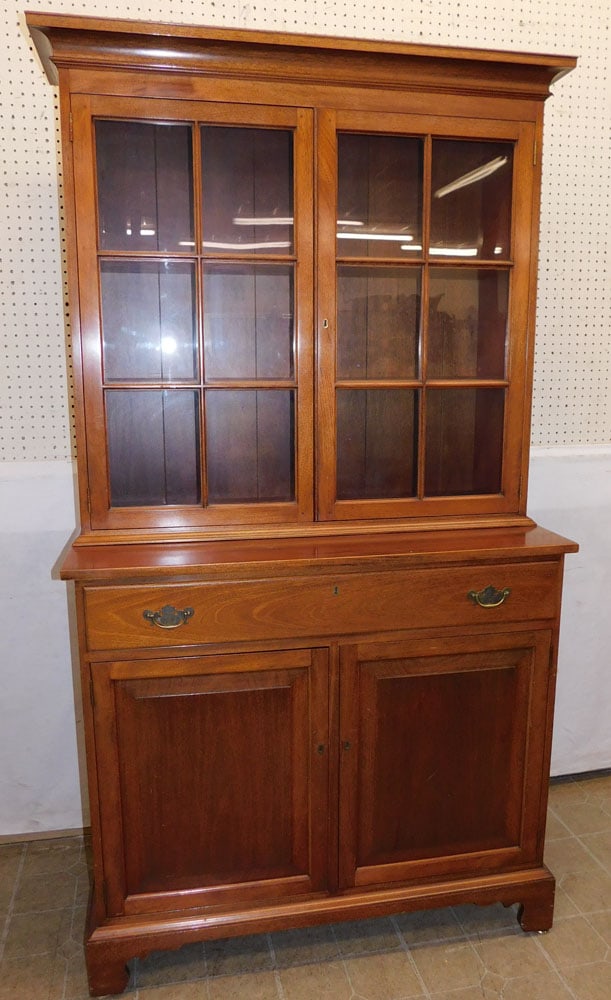 Mahogany 2 Part Cabinet by Suters: Mahogany 2 Part Cabinet by Suters . 41 1/2" W 20" D 77 1/4" H "ALL DESCRIPTIONS AND ANY CONDITION STATEMENT GIVEN BY LANGSTON AUCTION GALLERY ARE STRICTLY OPINIONS AND LANGSTON'S SHALL HAVE NO RESPONS