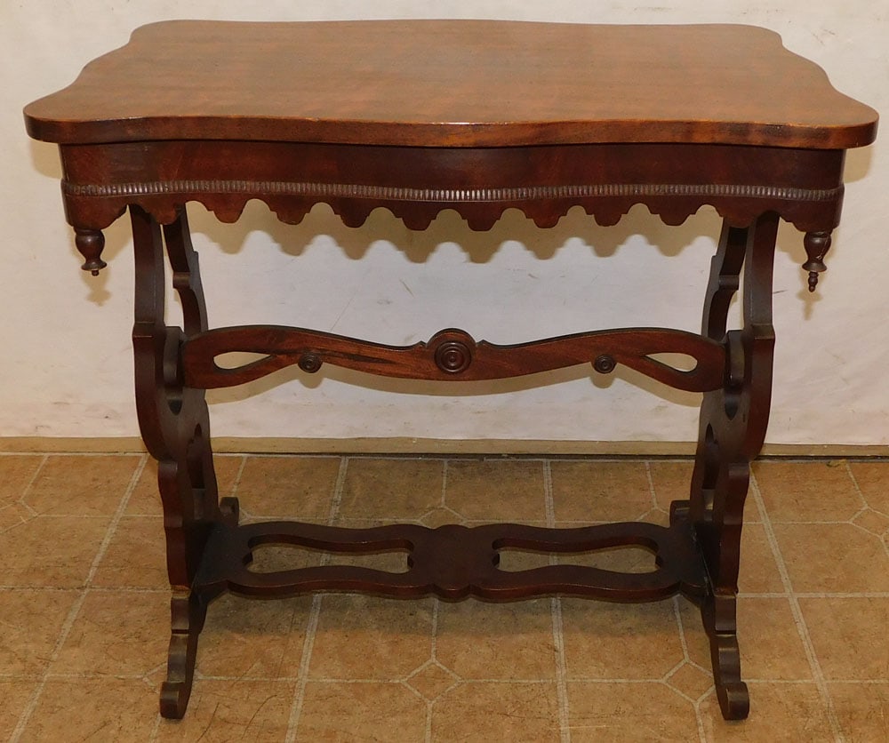 Antique Mahogany Console: Antique Mahogany Console . 28 1/2" W 17 1/2" D 27" H "ALL DESCRIPTIONS AND ANY CONDITION STATEMENT GIVEN BY LANGSTON AUCTION GALLERY ARE STRICTLY OPINIONS AND LANGSTON'S SHALL HAVE NO RESPONSIBILITY F