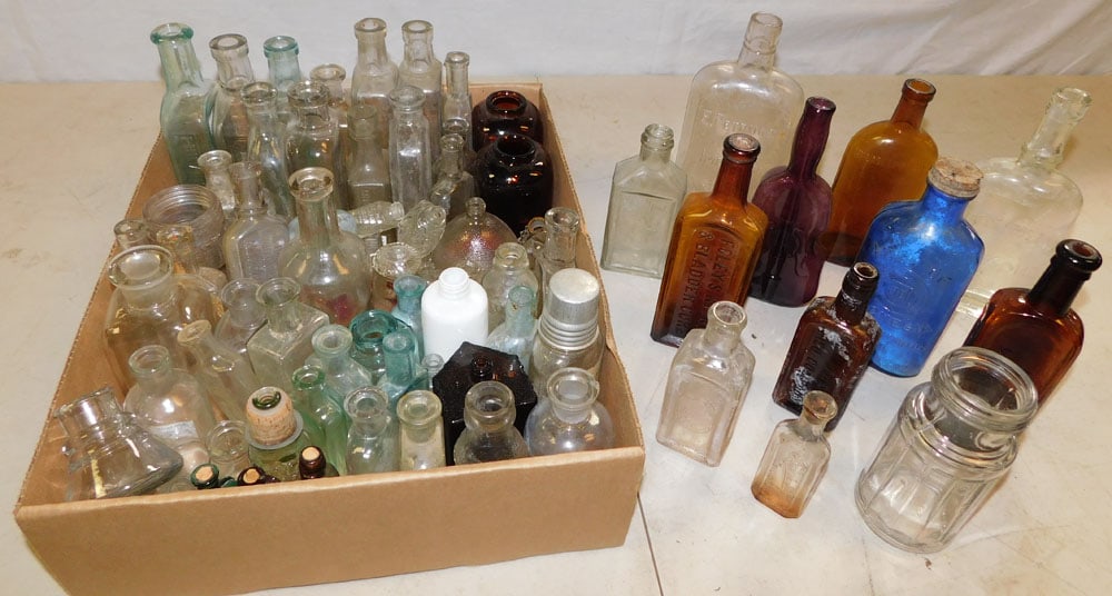 Lot of Glass Medicine Bottles: Lot of Glass Medicine Bottles. "ALL DESCRIPTIONS AND ANY CONDITION STATEMENT GIVEN BY LANGSTON AUCTION GALLERY ARE STRICTLY OPINIONS AND LANGSTON'S SHALL HAVE NO RESPONSIBILITY FOR ERRORS OR OMISSIONS