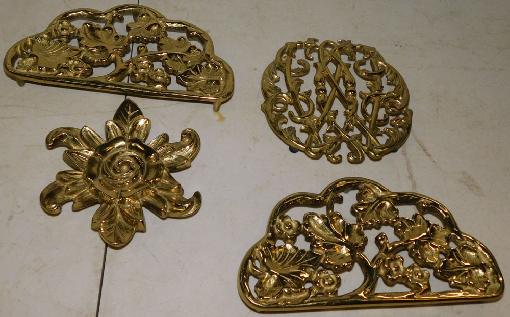 Lot of VA Metalcrafters Brass Trivets: Lot of VA Metalcrafters Brass Trivets. "ALL DESCRIPTIONS AND ANY CONDITION STATEMENT GIVEN BY LANGSTON AUCTION GALLERY ARE STRICTLY OPINIONS AND LANGSTON'S SHALL HAVE NO RESPONSIBILITY FOR ERRORS OR O