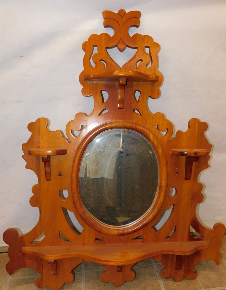 Pierced Carved Mahogany Wall Mirror: Pierced Carved Mahogany Wall Mirror. 33" W 39 1/2" H"ALL DESCRIPTIONS AND ANY CONDITION STATEMENT GIVEN BY LANGSTON AUCTION GALLERY ARE STRICTLY OPINIONS AND LANGSTON'S SHALL HAVE NO RESPONSIBILITY FO