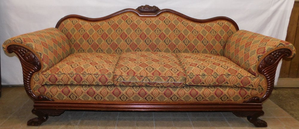 carved mahogany upholstered sofa: carved mahogany upholstered sofa. 85 L 21 D 26 1/4 H"ALL DESCRIPTIONS AND ANY CONDITION STATEMENT GIVEN BY LANGSTON AUCTION GALLERY ARE STRICTLY OPINIONS AND LANGSTON'S SHALL HAVE NO RESPONSIBILITY FO