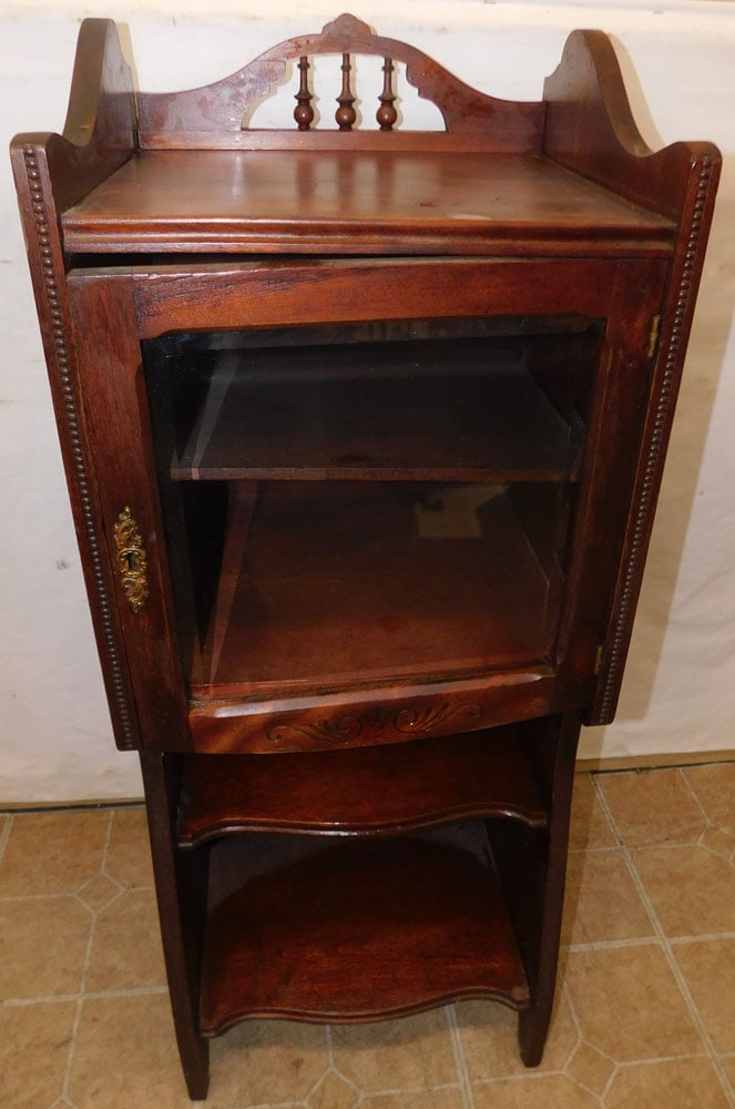 antique walnut glass door cabinet: antique walnut glass door cabinet . 16" W 14" D 41 3/4" H"ALL DESCRIPTIONS AND ANY CONDITION STATEMENT GIVEN BY LANGSTON AUCTION GALLERY ARE STRICTLY OPINIONS AND LANGSTON'S SHALL HAVE NO RESPONSIBILI