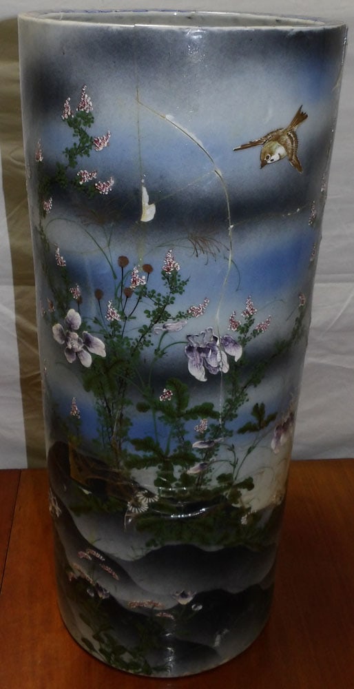 antique oriental porcelain umbrella stand, as is: antique oriental porcelain umbrella stand, as is. 23 1/2" H"ALL DESCRIPTIONS AND ANY CONDITION STATEMENT GIVEN BY LANGSTON AUCTION GALLERY ARE STRICTLY OPINIONS AND LANGSTON'S SHALL HAVE NO RESPONSIBI