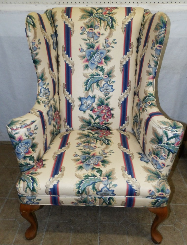 upholstered wing back chair: upholstered wing back chair. 42" H"ALL DESCRIPTIONS AND ANY CONDITION STATEMENT GIVEN BY LANGSTON AUCTION GALLERY ARE STRICTLY OPINIONS AND LANGSTON'S SHALL HAVE NO RESPONSIBILITY FOR ERRORS OR OMISSI