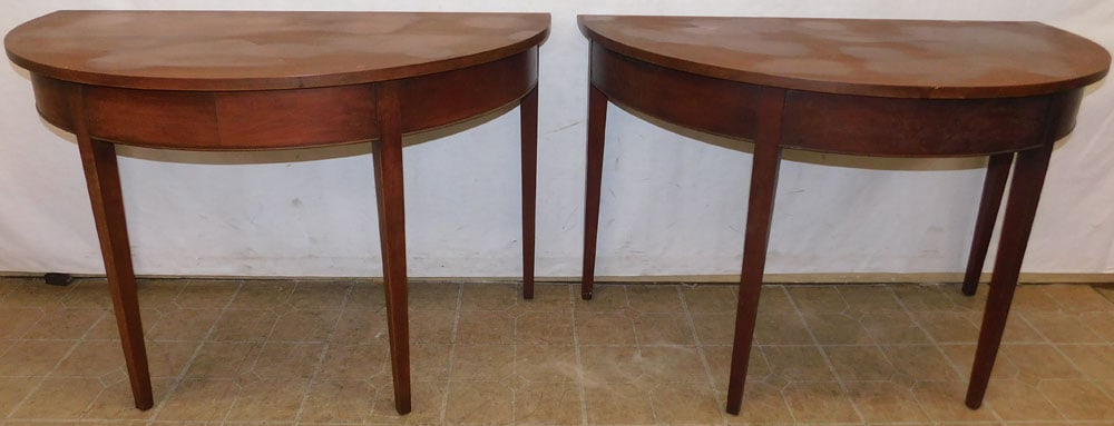 pair of mahogany consoles: pair of mahogany consoles. 47" W 26" D 30 1/4" H"ALL DESCRIPTIONS AND ANY CONDITION STATEMENT GIVEN BY LANGSTON AUCTION GALLERY ARE STRICTLY OPINIONS AND LANGSTON'S SHALL HAVE NO RESPONSIBILITY FOR ER