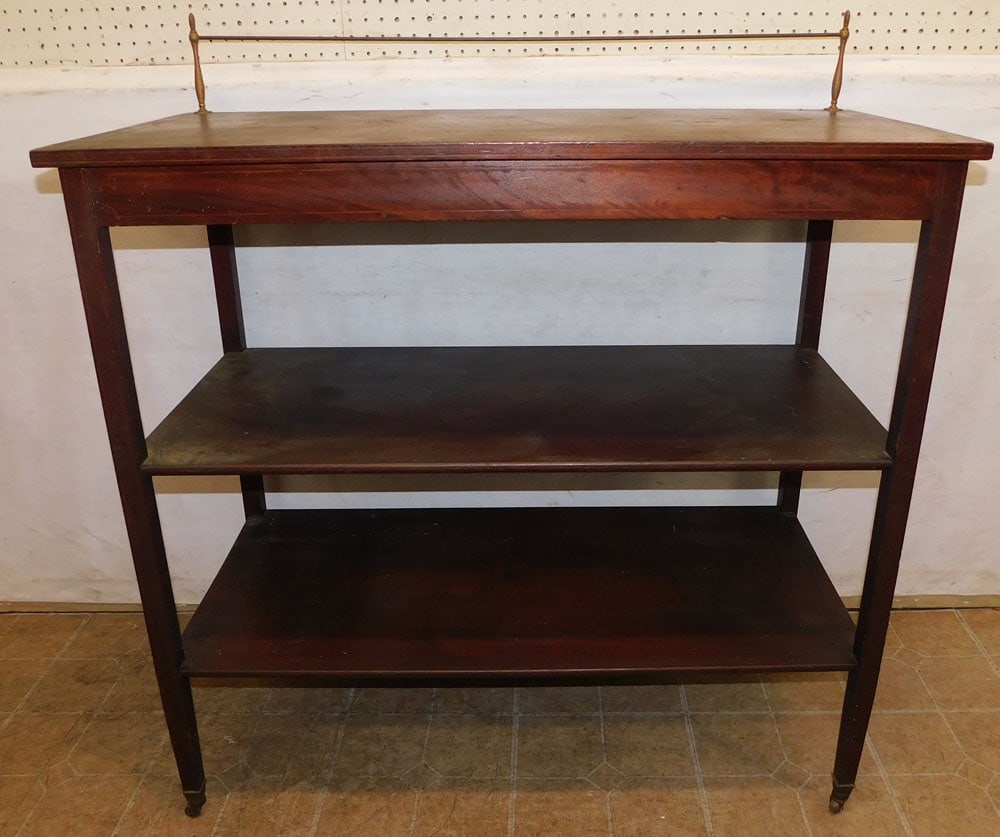 mahogany 3 tier console: mahogany 3 tier console. 42" W 19 3/4" D 45 3/4" H"ALL DESCRIPTIONS AND ANY CONDITION STATEMENT GIVEN BY LANGSTON AUCTION GALLERY ARE STRICTLY OPINIONS AND LANGSTON'S SHALL HAVE NO RESPONSIBILITY FOR 