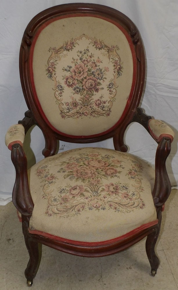 antique carved walnut Victorian arm chair: antique carved walnut Victorian arm chair. 41" H"ALL DESCRIPTIONS AND ANY CONDITION STATEMENT GIVEN BY LANGSTON AUCTION GALLERY ARE STRICTLY OPINIONS AND LANGSTON'S SHALL HAVE NO RESPONSIBILITY FOR ER
