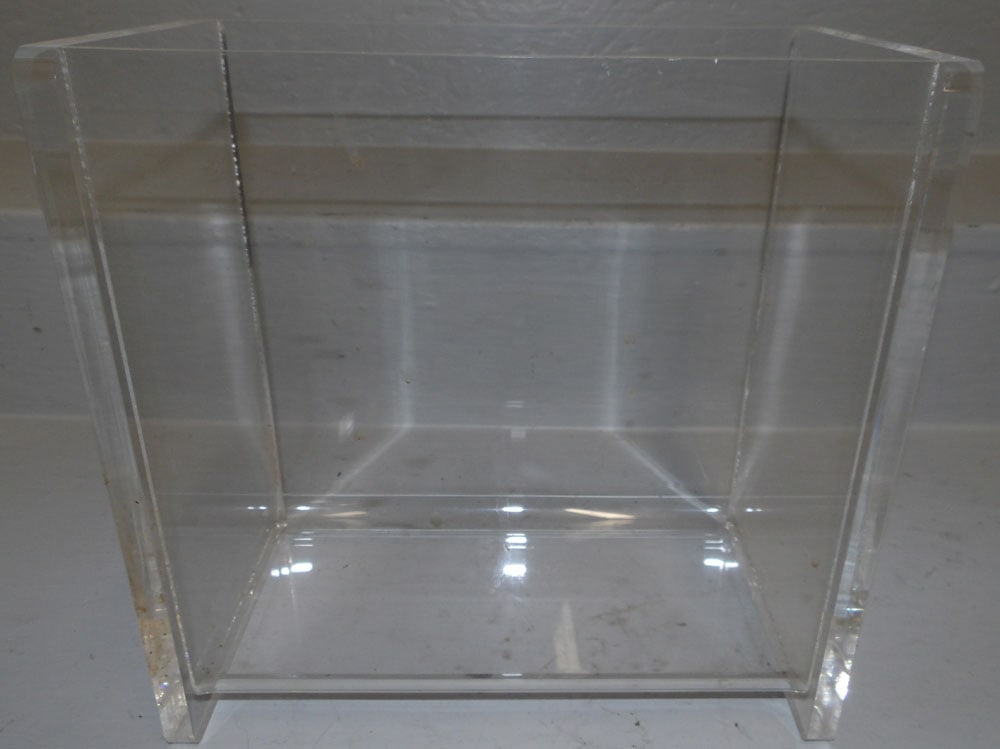 Mid Century Modern Lucite Jardiniere: Mid Century Modern Lucite Jardiniere . 11" W 5 1/2" D 11" H"ALL DESCRIPTIONS AND ANY CONDITION STATEMENT GIVEN BY LANGSTON AUCTION GALLERY ARE STRICTLY OPINIONS AND LANGSTON'S SHALL HAVE NO RESPONSIBI