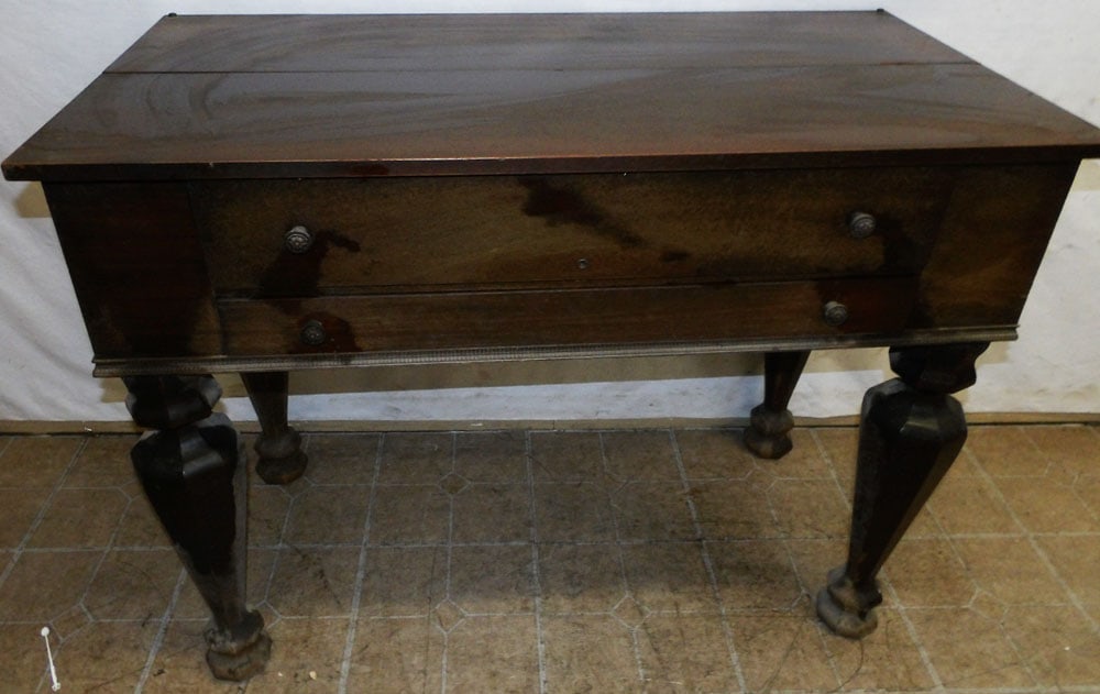 antique mahogany desk: antique mahogany desk. 44" W 22 1/4" D 34 1/2" H"ALL DESCRIPTIONS AND ANY CONDITION STATEMENT GIVEN BY LANGSTON AUCTION GALLERY ARE STRICTLY OPINIONS AND LANGSTON'S SHALL HAVE NO RESPONSIBILITY FOR ER