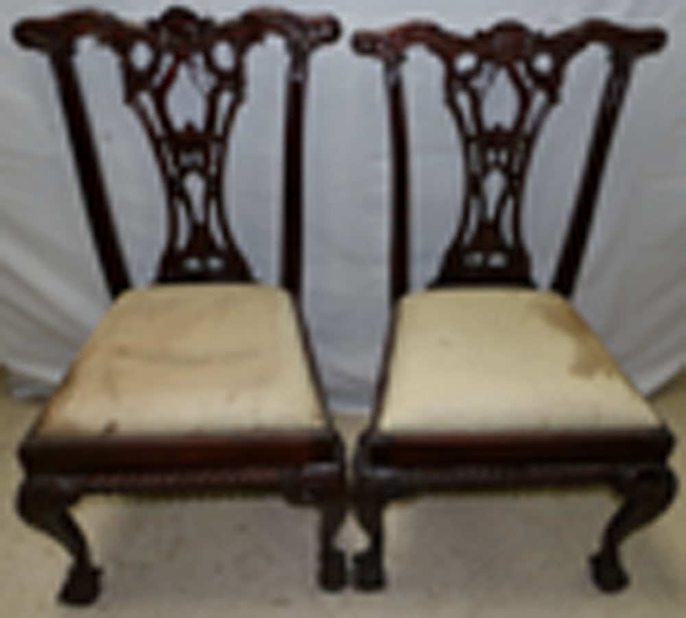 pair of carved mahogany side chairs: pair of carved mahogany side chairs. 39" H"ALL DESCRIPTIONS AND ANY CONDITION STATEMENT GIVEN BY LANGSTON AUCTION GALLERY ARE STRICTLY OPINIONS AND LANGSTON'S SHALL HAVE NO RESPONSIBILITY FOR ERRORS O