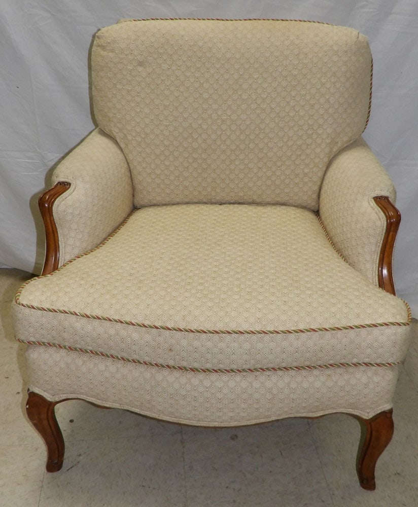cherry and upholstered arm chair: cherry and upholstered arm chair . 32 1/2" H"ALL DESCRIPTIONS AND ANY CONDITION STATEMENT GIVEN BY LANGSTON AUCTION GALLERY ARE STRICTLY OPINIONS AND LANGSTON'S SHALL HAVE NO RESPONSIBILITY FOR ERRORS