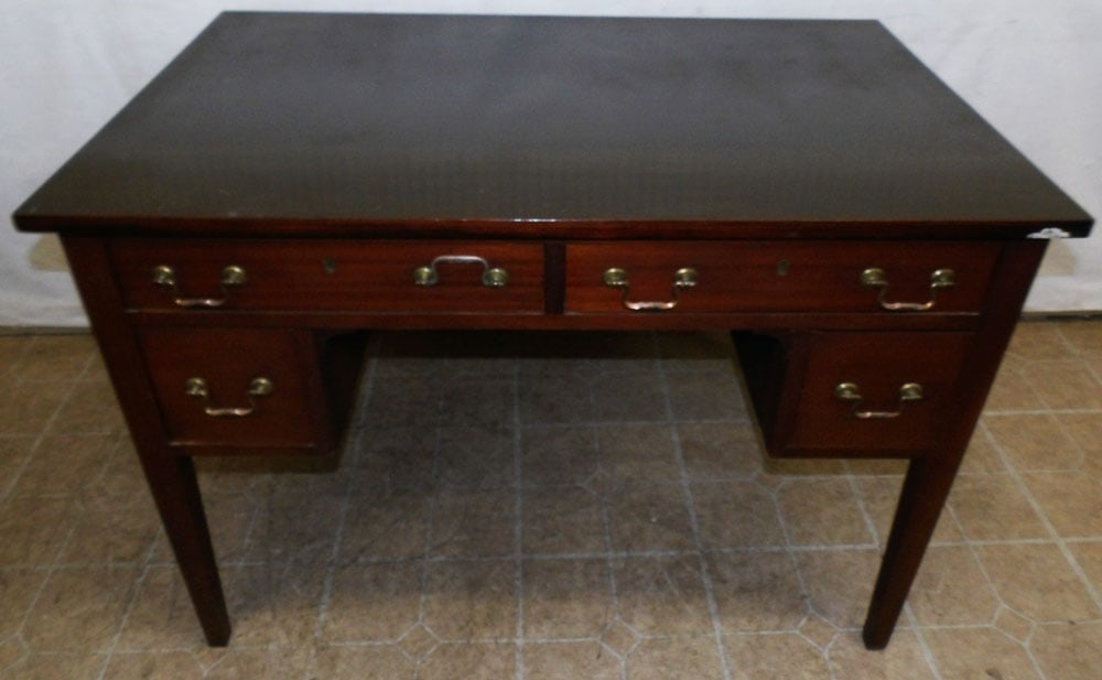 Mahogany Desk: Mahogany Desk. 42" W 26" D 30 1/4" H"ALL DESCRIPTIONS AND ANY CONDITION STATEMENT GIVEN BY LANGSTON AUCTION GALLERY ARE STRICTLY OPINIONS AND LANGSTON'S SHALL HAVE NO RESPONSIBILITY FOR ERRORS OR OMIS