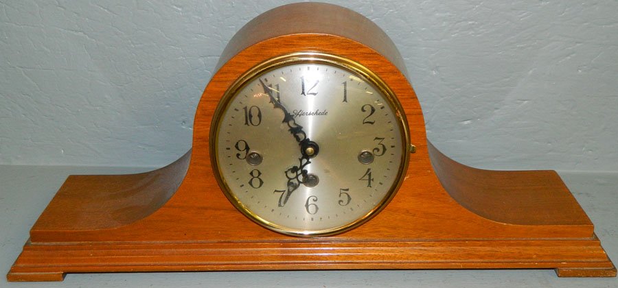 Herschede wal. head & shoulders chiming clock.: Herschede walnut head and shoulders chiming shelf clock.