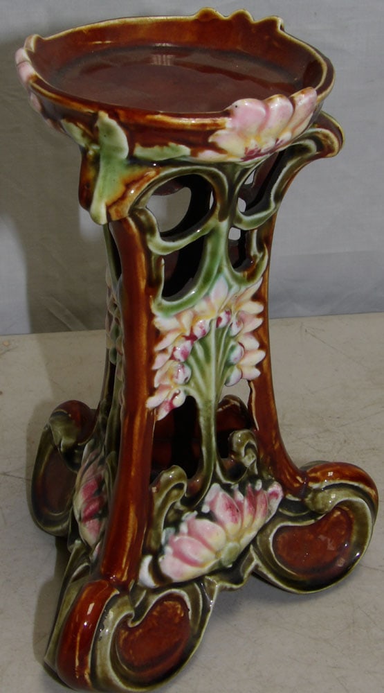 Antique Open Work Majolica Pillar Candle Stand: Antique Open Work Majolica Pillar Candle Stand . 7 1/2" H ALL DESCRIPTIONS AND ANY CONDITION STATEMENT GIVEN BY LANGSTON AUCTION GALLERY ARE STRICTLY OPINIONS AND LANGSTON'S SHALL HAVE NO RESPONSIBILI
