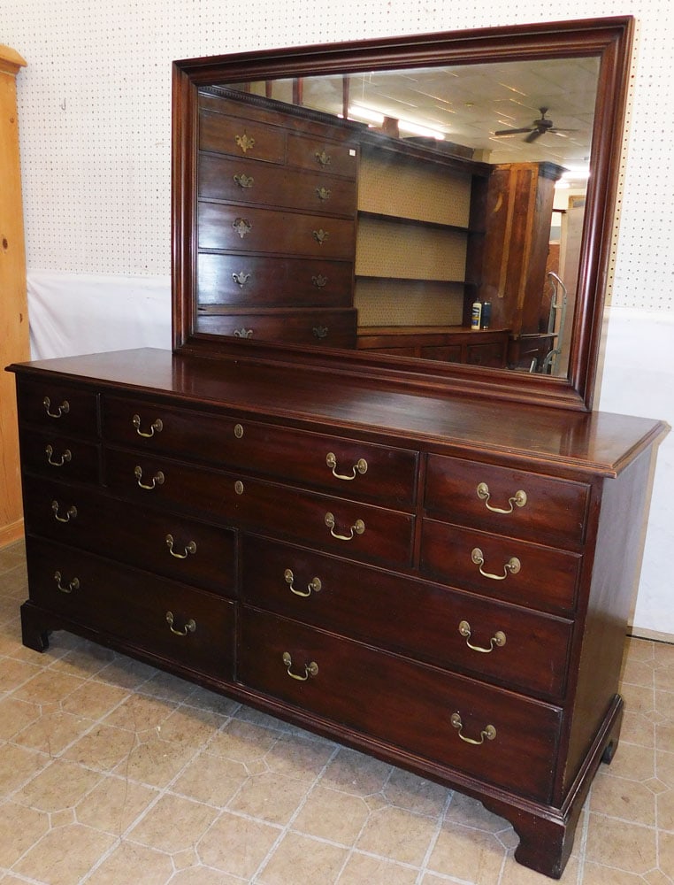 Mahogany Dresser with Mirror by Henkel Harris: Mahogany Dresser with Mirror by Henkel Harris. 66" W 20 1/2" D 68 3/4" H ALL DESCRIPTIONS AND ANY CONDITION STATEMENT GIVEN BY LANGSTON AUCTION GALLERY ARE STRICTLY OPINIONS AND LANGSTON'S SHALL HAVE 