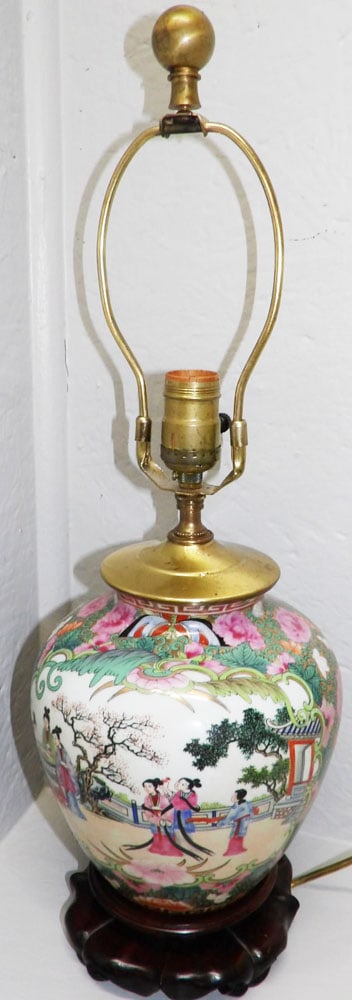 Paint Decorated Rose Medallion Porcelain Lamp on Carved Teakwood Stand: Paint Decorated Rose Medallion Porcelain Lamp on Carved Teakwood Stand . 22 1/4" H ALL DESCRIPTIONS AND ANY CONDITION STATEMENT GIVEN BY LANGSTON AUCTION GALLERY ARE STRICTLY OPINIONS AND LANGSTON'S S