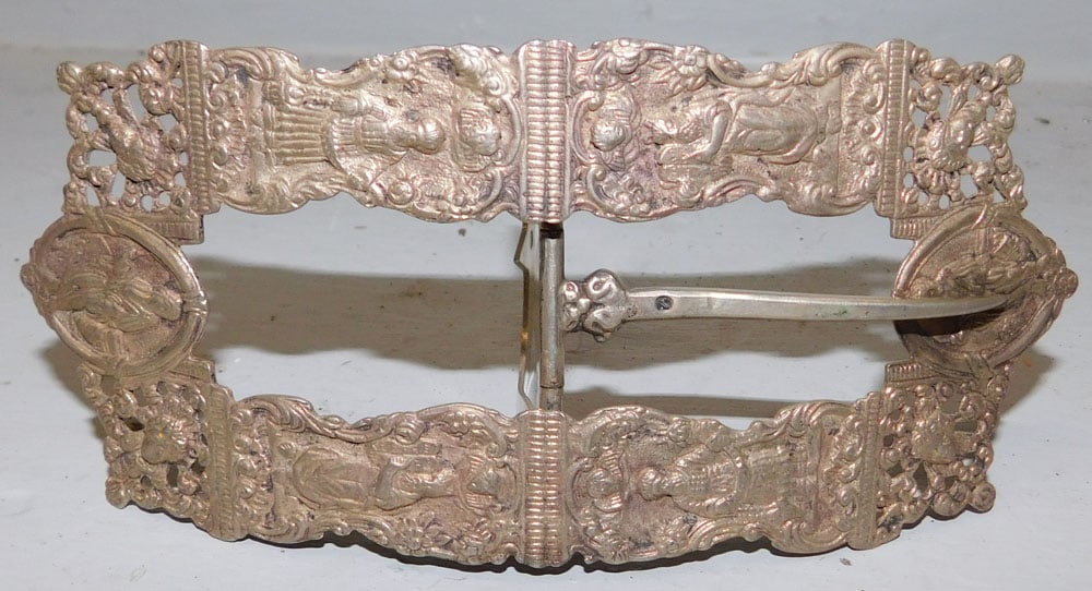Ornate Silver Belt Buckle, (Believed 800 Silver, Not Tested): Ornate Silver Belt Buckle, (Believed 800 Silver, Not Tested). 6" L 2 1/2" W ALL DESCRIPTIONS AND ANY CONDITION STATEMENT GIVEN BY LANGSTON AUCTION GALLERY ARE STRICTLY OPINIONS AND LANGSTON'S SHALL HA