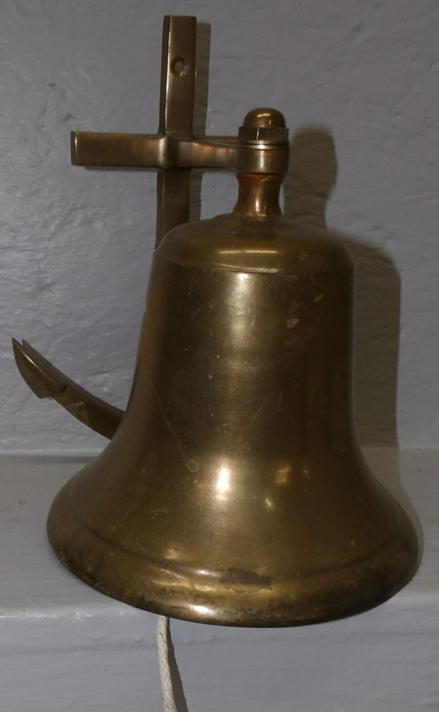 Cast Brass Bell: Cast Brass Bell . 10" H ALL DESCRIPTIONS AND ANY CONDITION STATEMENT GIVEN BY LANGSTON AUCTION GALLERY ARE STRICTLY OPINIONS AND LANGSTON'S SHALL HAVE NO RESPONSIBILITY FOR ERRORS OR OMISSIONS. THE AB