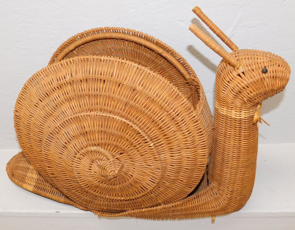 Wicker Form Snail Basket: Wicker Form Snail Basket . 24" x 16 1/2" ALL DESCRIPTIONS AND ANY CONDITION STATEMENT GIVEN BY LANGSTON AUCTION GALLERY ARE STRICTLY OPINIONS AND LANGSTON'S SHALL HAVE NO RESPONSIBILITY FOR ERRORS OR