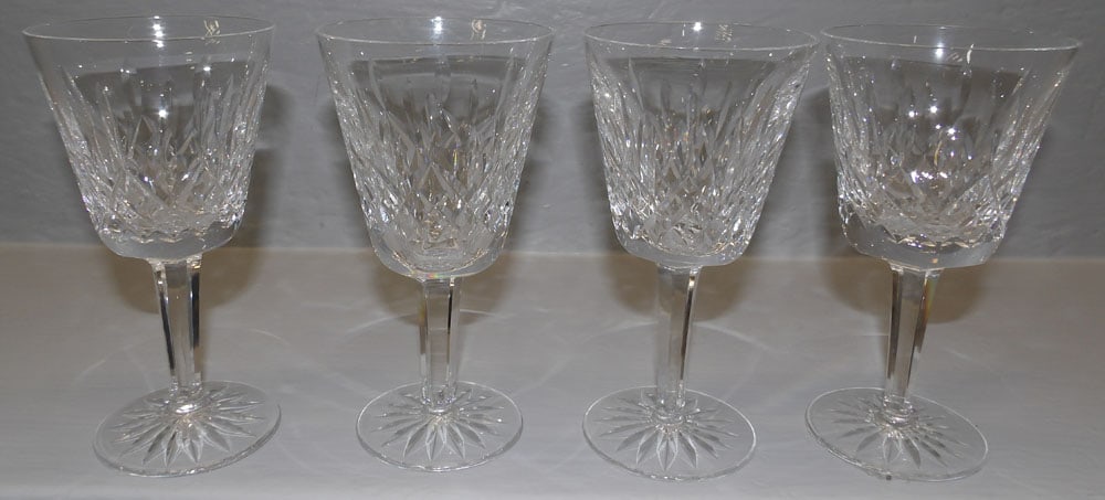 Set of 4 Waterford Lismore Wine Goblets: Set of 4 Waterford Lismore Wine Goblets. 6" H ALL DESCRIPTIONS AND ANY CONDITION STATEMENT GIVEN BY LANGSTON AUCTION GALLERY ARE STRICTLY OPINIONS AND LANGSTON'S SHALL HAVE NO RESPONSIBILITY FOR ERROR