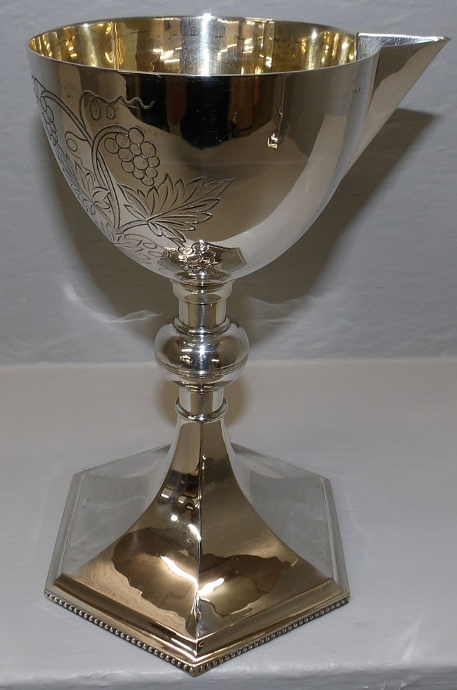 Sterling E B Mcelynn Chalice with Grape & Cable Engraving, (17.8 ozt): Sterling E B Mcelynn Chalice with Grape & Cable Engraving, (17.8 ozt). 9" H ALL DESCRIPTIONS AND ANY CONDITION STATEMENT GIVEN BY LANGSTON AUCTION GALLERY ARE STRICTLY OPINIONS AND LANGSTON'S SHALL HA