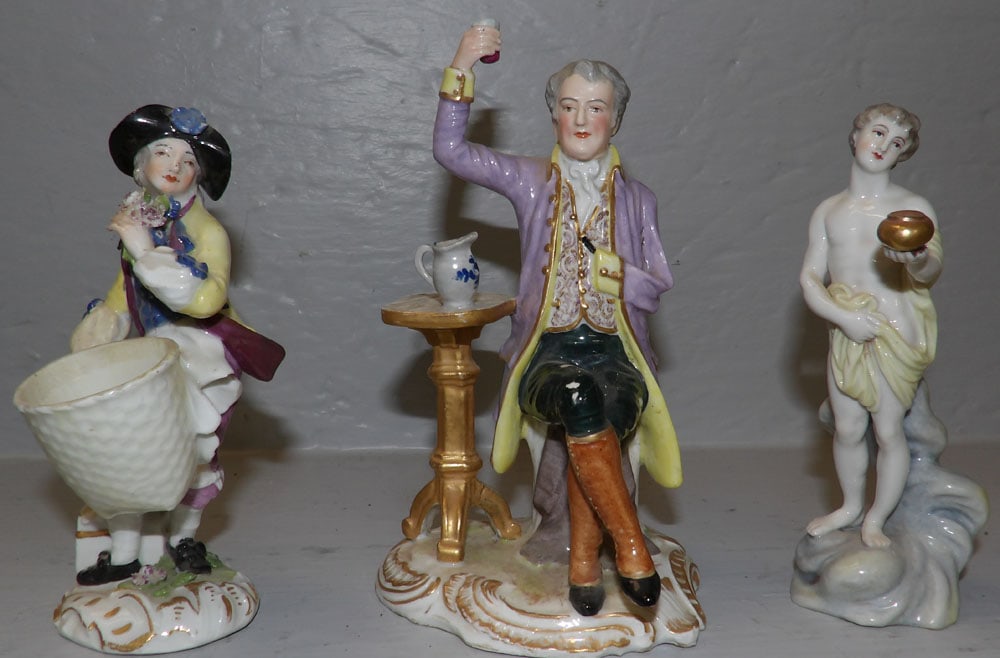 2 Meissen Figurines & 1 German Figurine: 2 Meissen Figurines & 1 German Figurine. Up to 6 1/2" H ALL DESCRIPTIONS AND ANY CONDITION STATEMENT GIVEN BY LANGSTON AUCTION GALLERY ARE STRICTLY OPINIONS AND LANGSTON'S SHALL HAVE NO RESPONSIBILITY