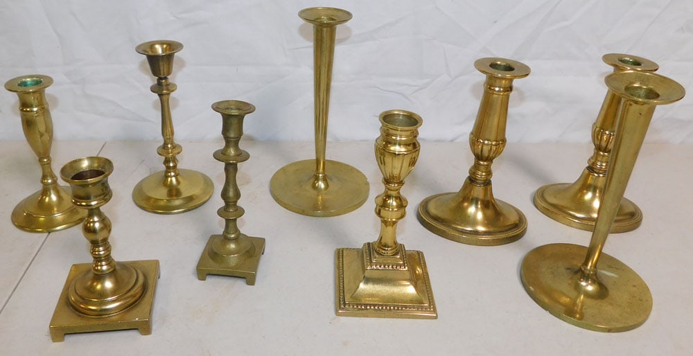 Lot of Brass Candlesticks: Lot of Brass Candlesticks. ALL DESCRIPTIONS AND ANY CONDITION STATEMENT GIVEN BY LANGSTON AUCTION GALLERY ARE STRICTLY OPINIONS AND LANGSTON'S SHALL HAVE NO RESPONSIBILITY FOR ERRORS OR OMISSIONS. THE