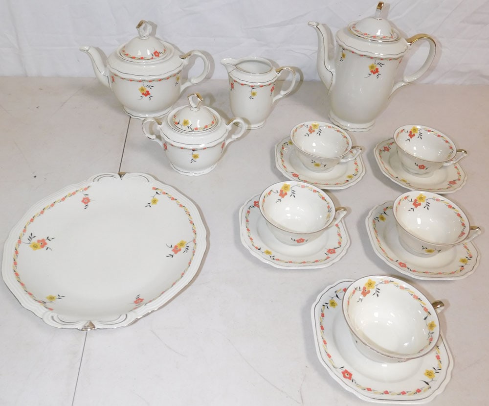 Porcelain Tea Set: Porcelain Tea Set . ALL DESCRIPTIONS AND ANY CONDITION STATEMENT GIVEN BY LANGSTON AUCTION GALLERY ARE STRICTLY OPINIONS AND LANGSTON'S SHALL HAVE NO RESPONSIBILITY FOR ERRORS OR OMISSIONS. THE ABSENC