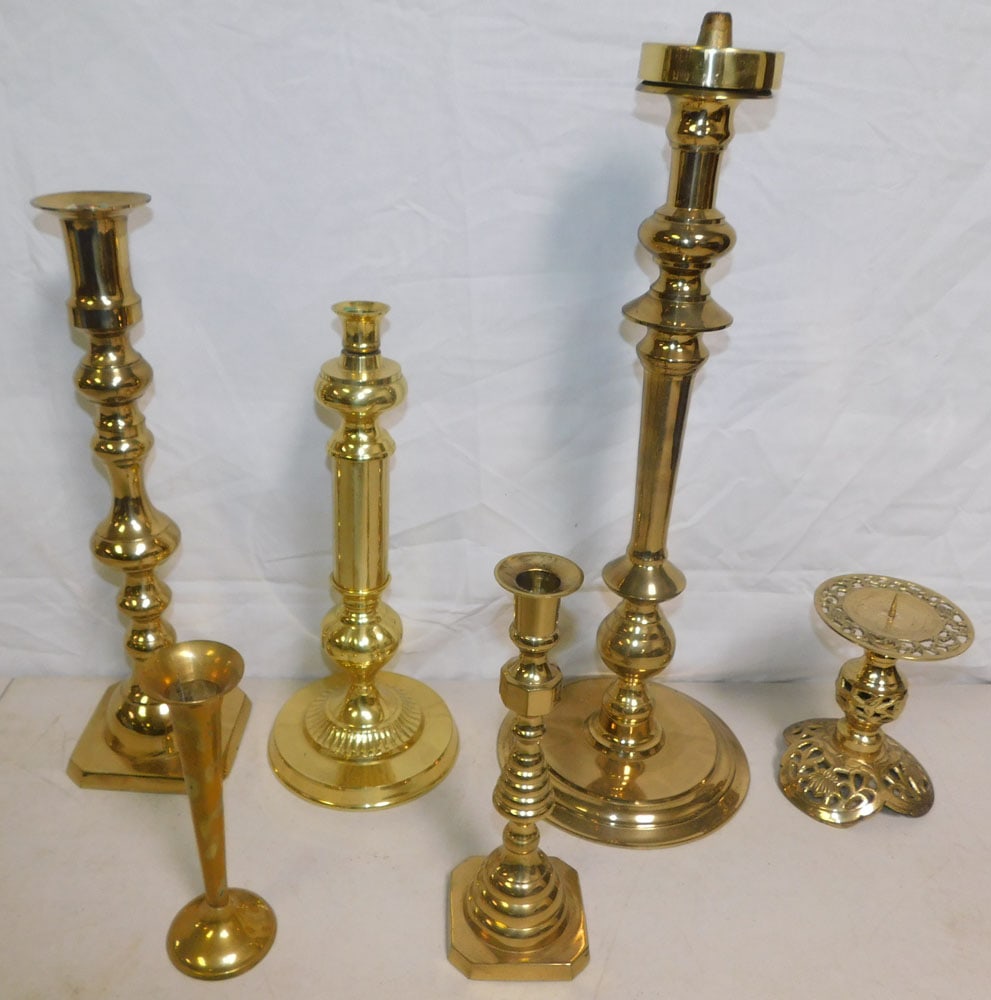 Lot of Brass Candlesticks: Lot of Brass Candlesticks . ALL DESCRIPTIONS AND ANY CONDITION STATEMENT GIVEN BY LANGSTON AUCTION GALLERY ARE STRICTLY OPINIONS AND LANGSTON'S SHALL HAVE NO RESPONSIBILITY FOR ERRORS OR OMISSIONS. TH