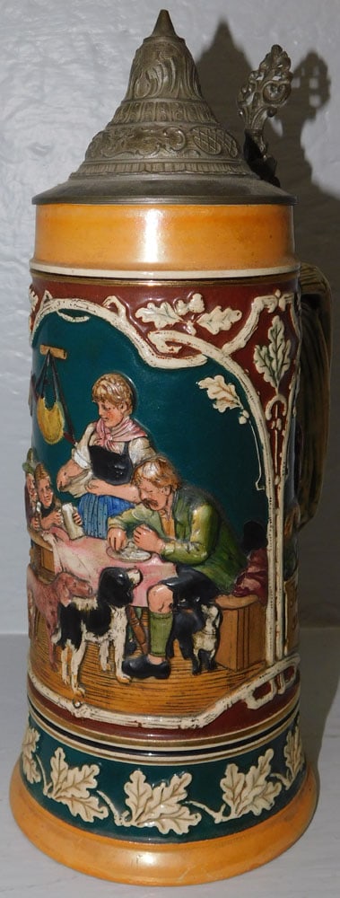 German Beer Stein with Pewter Top: German Beer Stein with Pewter Top. 11 1/4" H ALL DESCRIPTIONS AND ANY CONDITION STATEMENT GIVEN BY LANGSTON AUCTION GALLERY ARE STRICTLY OPINIONS AND LANGSTON'S SHALL HAVE NO RESPONSIBILITY FOR ERRORS