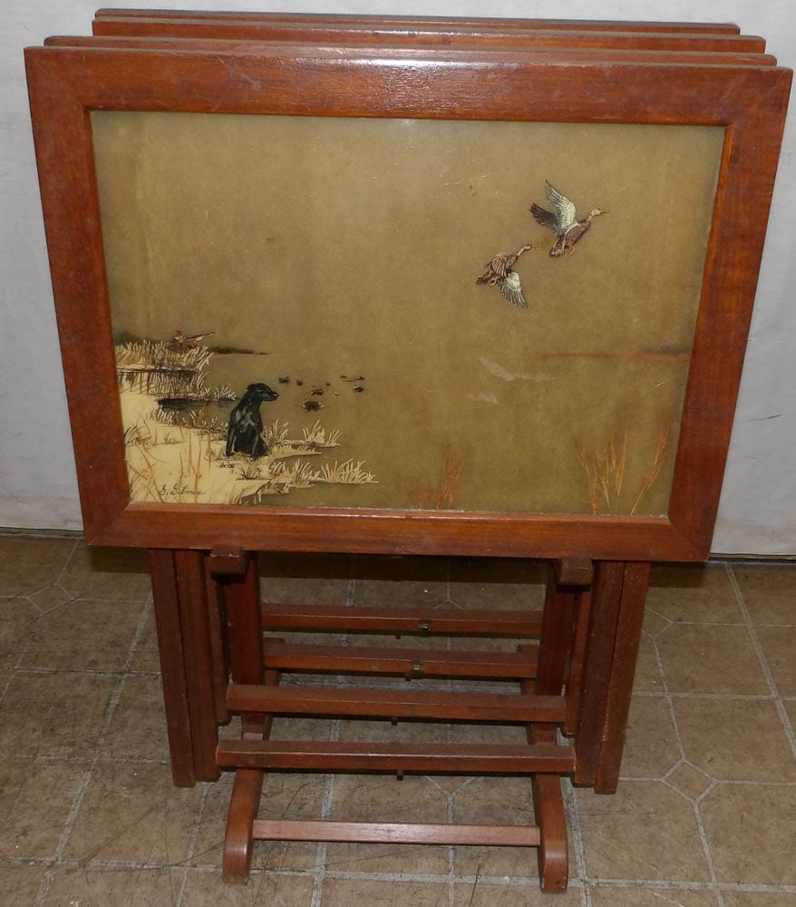 set of walnut tv tables with hunt scene tops: set of walnut tv tables with hunt scene tops. 23 3/4" W 9" D 34 3/4" H ALL DESCRIPTIONS AND ANY CONDITION STATEMENT GIVEN BY LANGSTON AUCTION GALLERY ARE STRICTLY OPINIONS AND LANGSTON'S SHALL HAVE NO