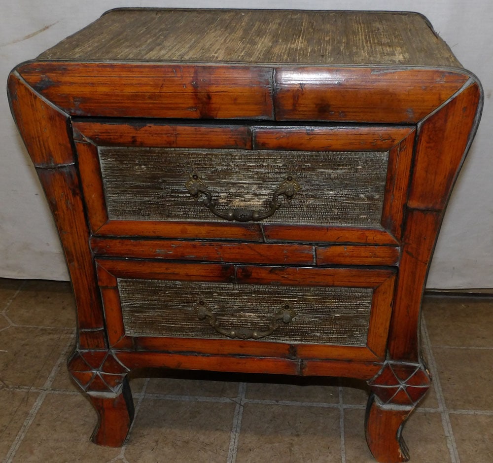 rattan 2 drawer stand: rattan 2 drawer stand. 18 1/2" W 12 1/2" D 20 3/4" H ALL DESCRIPTIONS AND ANY CONDITION STATEMENT GIVEN BY LANGSTON AUCTION GALLERY ARE STRICTLY OPINIONS AND LANGSTON'S SHALL HAVE NO RESPONSIBILITY FO