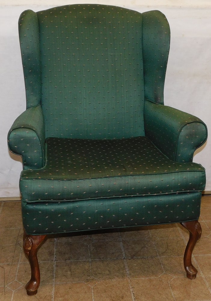 upholstered wing back chair: upholstered wing back chair. 41 1/2" H ALL DESCRIPTIONS AND ANY CONDITION STATEMENT GIVEN BY LANGSTON AUCTION GALLERY ARE STRICTLY OPINIONS AND LANGSTON'S SHALL HAVE NO RESPONSIBILITY FOR ERRORS OR OM