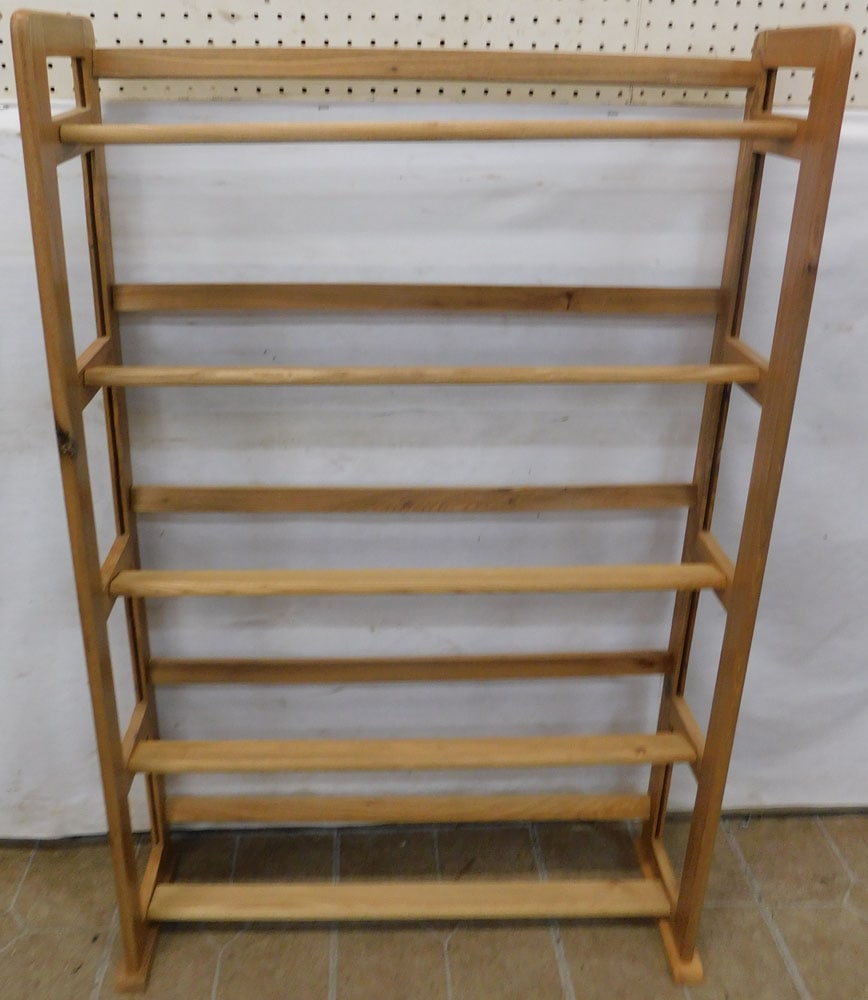 walnut shoe shelf: walnut shoe shelf. 29 1/4" W 46" H ALL DESCRIPTIONS AND ANY CONDITION STATEMENT GIVEN BY LANGSTON AUCTION GALLERY ARE STRICTLY OPINIONS AND LANGSTON'S SHALL HAVE NO RESPONSIBILITY FOR ERRORS OR OMISSI