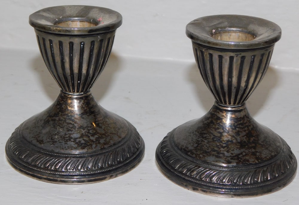 Pair of Sterling Weighted Candlesticks: Pair of Sterling Weighted Candlesticks. ALL DESCRIPTIONS AND ANY CONDITION STATEMENT GIVEN BY LANGSTON AUCTION GALLERY ARE STRICTLY OPINIONS AND LANGSTON'S SHALL HAVE NO RESPONSIBILITY FOR ERRORS OR O