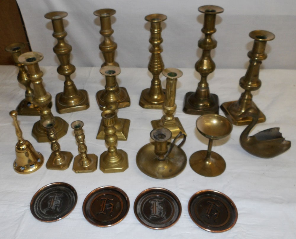 Lot of Brass Candlesticks: Lot of Brass Candlesticks . ALL DESCRIPTIONS AND ANY CONDITION STATEMENT GIVEN BY LANGSTON AUCTION GALLERY ARE STRICTLY OPINIONS AND LANGSTON'S SHALL HAVE NO RESPONSIBILITY FOR ERRORS OR OMISSIONS. TH