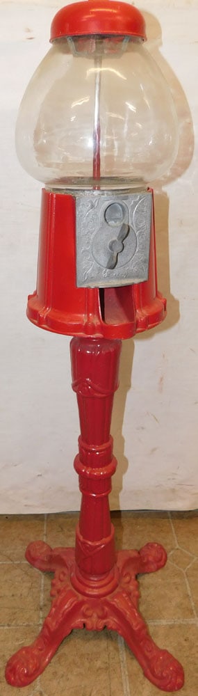 Vintage Painted Metal & Glass Candy Dispenser: Vintage Painted Metal & Glass Candy Dispenser . 39 1/2" H ALL DESCRIPTIONS AND ANY CONDITION STATEMENT GIVEN BY LANGSTON AUCTION GALLERY ARE STRICTLY OPINIONS AND LANGSTON'S SHALL HAVE NO RESPONSIBILI