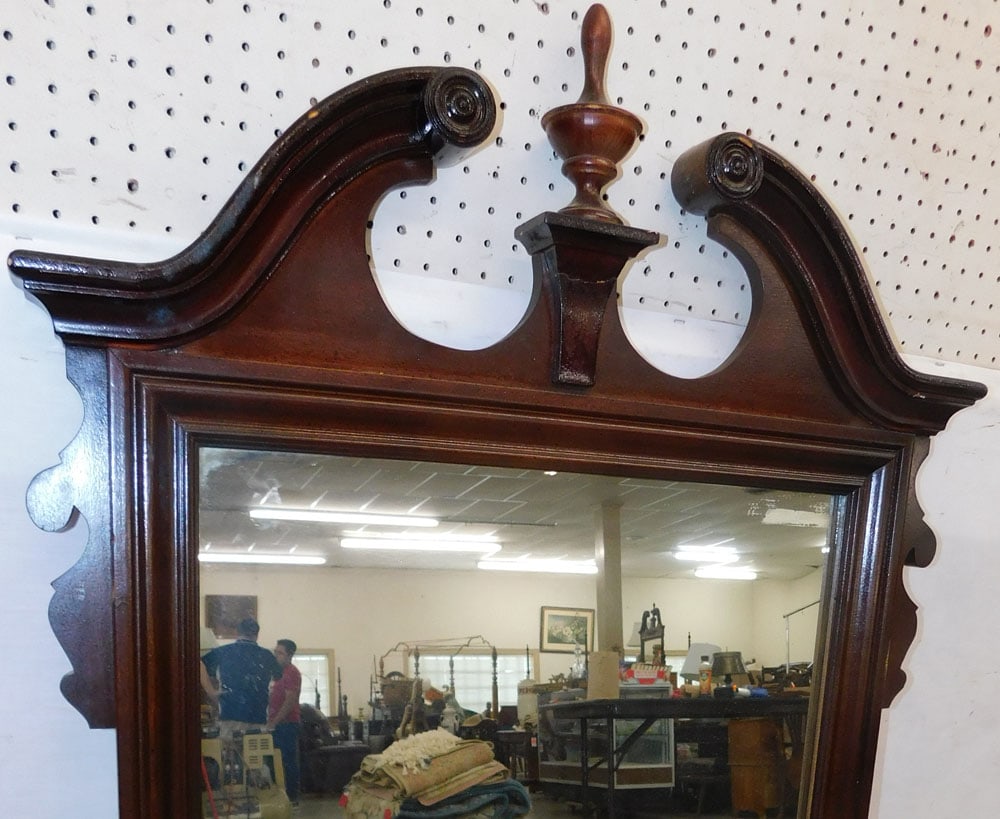 mahogany framed mirror: mahogany framed mirror. 33 1/4 by 50 ALL DESCRIPTIONS AND ANY CONDITION STATEMENT GIVEN BY LANGSTON AUCTION GALLERY ARE STRICTLY OPINIONS AND LANGSTON'S SHALL HAVE NO RESPONSIBILITY FOR ERRORS OR OMIS